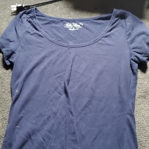 A blue shirt with a low front